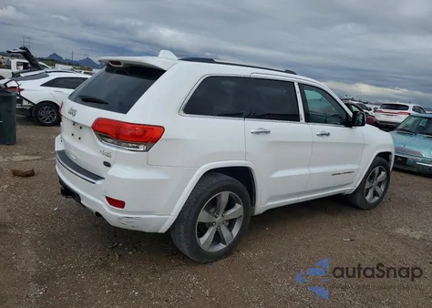 2014 Jeep Grand Cherokee Overland из США, поврежденный, VIN 1C4RJFCM1EC372040
